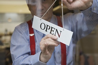 image of business owner opening shop